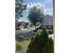 View of homes, garages, and lawns in the neighborhood at 241 Balaban Cir # 241, Woodstock, GA 30188