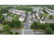 Aerial view of neighborhood featuring sidewalks, landscaping and well-maintained lawns at 241 Balaban Cir # 241, Woodstock, GA 30188