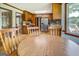 Inviting kitchen with wood cabinets, stainless steel appliances, and wood laminate flooring, perfect for Gathering gatherings at 369 Parker Rd, Mcdonough, GA 30252