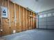 Spacious garage interior with an electrical panel visible at 8113 Fieldstream Way, Douglasville, GA 30134