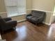 Comfortable living room with plush seating and natural light, great for entertaining at 8113 Fieldstream Way, Douglasville, GA 30134