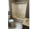Clean bathroom with a shower-tub combo, toilet, and vanity with sink at 3155 E Point St, East Point, GA 30344