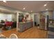 Open-concept kitchen and dining area with stainless steel appliances and ample countertop space at 439 River Rd, Jonesboro, GA 30236