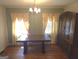 Traditional dining room with hardwood floors, a large table, and classic accents for Gathering gatherings at 1712 Clifton Se Way, Atlanta, GA 30316