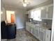 Well-maintained kitchen with grey cabinetry, modern appliances, and a clean, functional layout at 1712 Clifton Se Way, Atlanta, GA 30316