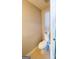 Simple half bathroom featuring a white toilet and tile flooring at 5553 Strathmoor Manor Cir, Lithonia, GA 30058