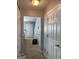 Neutral hallway with multiple doorways, leading to other rooms in the home at 5553 Strathmoor Manor Cir, Lithonia, GA 30058