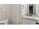 Cozy bathroom features a granite countertop vanity and neutral wall color at 935 S Laney Rd, Locust Grove, GA 30248