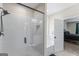 New bathroom with tiled shower, soaking tub, and access to the main bedroom at 935 S Laney Rd, Locust Grove, GA 30248