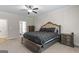 Spacious main bedroom featuring a neutral color palette and an ensuite bathroom at 935 S Laney Rd, Locust Grove, GA 30248
