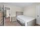 Bedroom with neutral carpet, a twin bed, and access to the hallway at 935 S Laney Rd, Locust Grove, GA 30248