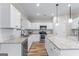 Bright kitchen with stainless appliances, granite counters and a large island at 935 S Laney Rd, Locust Grove, GA 30248