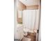 Bathroom featuring a vanity with granite counters and a shower with a stylish curtain at 401 N Lost Lake Cv, Villa Rica, GA 30180