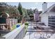 Deck featuring outdoor seating and a wooden play set in the backyard at 401 N Lost Lake Cv, Villa Rica, GA 30180