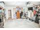 Organized two-car garage with storage solutions and easy access at 401 N Lost Lake Cv, Villa Rica, GA 30180