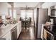 Eat-in kitchen with modern appliances and a breakfast nook at 401 N Lost Lake Cv, Villa Rica, GA 30180