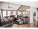 Comfortable living room with vaulted ceilings and ample seating at 401 N Lost Lake Cv, Villa Rica, GA 30180