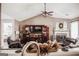 Bright living room with vaulted ceilings and a cozy fireplace at 401 N Lost Lake Cv, Villa Rica, GA 30180