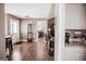 Inviting living area with hardwood floors, coat rack, and an open floor plan at 401 N Lost Lake Cv, Villa Rica, GA 30180