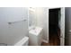 Bathroom with single sink vanity, framed mirror, and standard toilet at 500 Carillon Ct, Stone Mountain, GA 30083