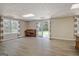 Finished basement with walkout, recessed lights, wood floors, and a small piano at 145 Driftwood Trl, Fayetteville, GA 30215