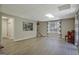 The finished basement has recessed lights, wood floors, a small piano, and stairway access at 145 Driftwood Trl, Fayetteville, GA 30215