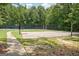 Outdoor basketball court surrounded by trees, providing a recreational space for residents at 145 Driftwood Trl, Fayetteville, GA 30215