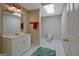 Basement bathroom with vanity sink, tile flooring, toilet, and an updated vanity at 145 Driftwood Trl, Fayetteville, GA 30215