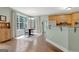Dining area featuring wood cabinets, stainless steel appliances, and natural light at 145 Driftwood Trl, Fayetteville, GA 30215