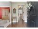 Inviting foyer features hardwood floors, decorative accents, and seamless transition to other living spaces at 145 Driftwood Trl, Fayetteville, GA 30215