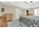 Spacious main bedroom with a tray ceiling, neutral walls, and carpeted floors at 145 Driftwood Trl, Fayetteville, GA 30215