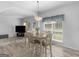 Light and bright dining area with wood-look floors and an abundance of natural light at 416 River Forest Dr, Mcdonough, GA 30252