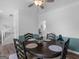 Dining room features dark wood table, chair rail detail, and a decorative light fixture at 416 River Forest Dr, Mcdonough, GA 30252