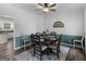 Dining room with wood-look floors, decorative rug, and chair rail at 416 River Forest Dr, Mcdonough, GA 30252