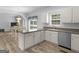 Charming kitchen features a breakfast nook, modern appliances, and ample counter space for cooking. Ready to prepare a meal at 416 River Forest Dr, Mcdonough, GA 30252