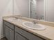 Bathroom with a double vanity, light countertops, and a large mirror at 631 Whitman Ln, Stockbridge, GA 30281