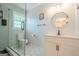 Updated bathroom featuring a glass enclosed shower and modern vanity at 3833 Bakers Ferry Sw Rd, Atlanta, GA 30331