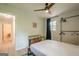Comfortable bedroom with natural light and convenient clothing rack at 3833 Bakers Ferry Sw Rd, Atlanta, GA 30331