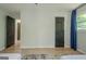 Spacious bedroom with light flooring, with view into other rooms at 3833 Bakers Ferry Sw Rd, Atlanta, GA 30331