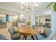 Open-concept layout showcasing the dining room, kitchen, and living room with modern finishes and natural light at 3833 Bakers Ferry Sw Rd, Atlanta, GA 30331