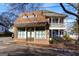Charming two-story mixed use building featuring a brick front and upper level balcony at 692 Kirkwood Se Ave # A, Atlanta, GA 30316