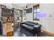 Stylish living room features sleek black floors, a comfortable sofa, and unique decor at 692 Kirkwood Se Ave # A, Atlanta, GA 30316
