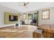 Spacious living room with hardwood floors, modern ceiling fan, and walk out patio doors at 692 Kirkwood Se Ave # A, Atlanta, GA 30316