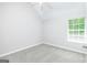 Cozy bedroom features carpet flooring, neutral walls, and natural light at 420 Callaway Pt, Mcdonough, GA 30252