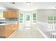 Bright breakfast nook with natural light, tile flooring, and views of the backyard at 420 Callaway Pt, Mcdonough, GA 30252