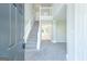 Bright foyer with a staircase leading to the second floor, offering a welcoming entrance at 420 Callaway Pt, Mcdonough, GA 30252