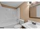 Cozy bathroom features a bathtub, toilet, and vanity with framed mirror for everyday convenience at 107 Club Dr, Locust Grove, GA 30248