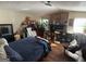Bedroom featuring hardwood floors and a brick wall at 2663 Shiloh Hills Ct, Snellville, GA 30039