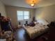 Bedroom with white walls and hardwood floors at 2663 Shiloh Hills Ct, Snellville, GA 30039