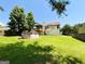 Home's backyard features a deck, covered porch, spacious yard and above-ground pool at 5445 Maltdie, Sugar Hill, GA 30518